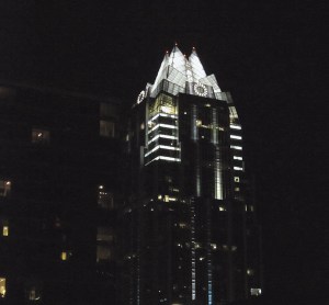 A building downtown, lit up all gothicky and sweet at night