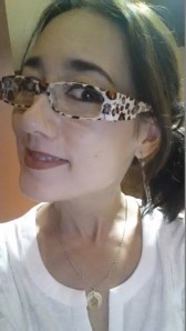 Animal print reading glasses in the shadows