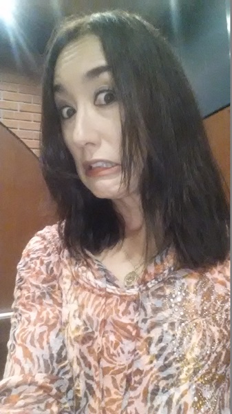 Being weird in the elevator to show you my "I see a roach" face. Derp.