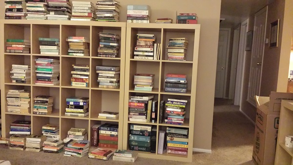 Book piles in the living room.