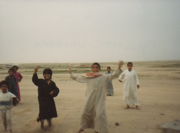 As we moved through Kuwait, children came running out from nowhere to greet us, happy and excited