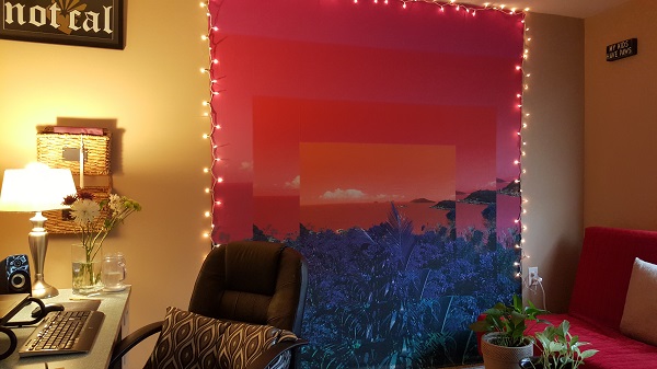 Long wall to the left (with tapestry and twinkle lights)