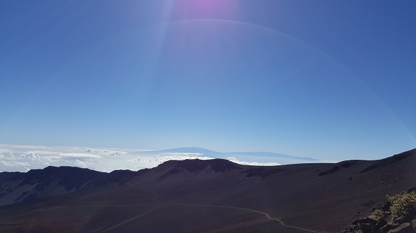Blue sky, carpet of clouds